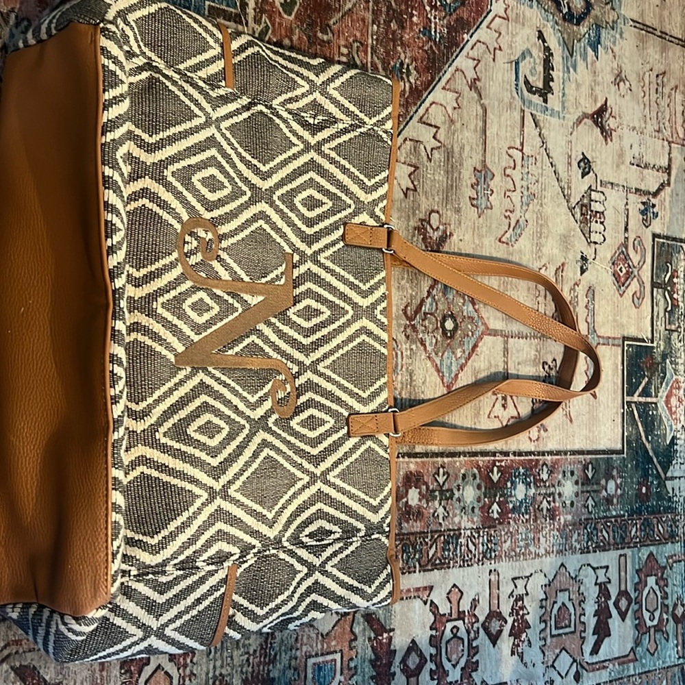 31 purse never used with N monogram